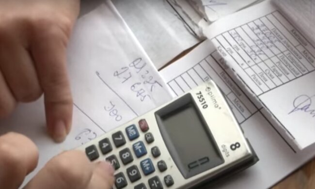 Платежки за коммунальные услуги. Фото: скриншот YouTubе