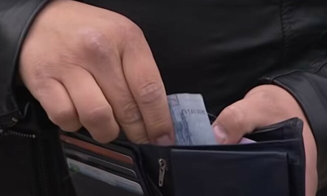 Деньги. Фото: скриншот YouTube-видео
