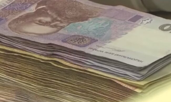 Деньги. Фото: скриншот YouTube-видео