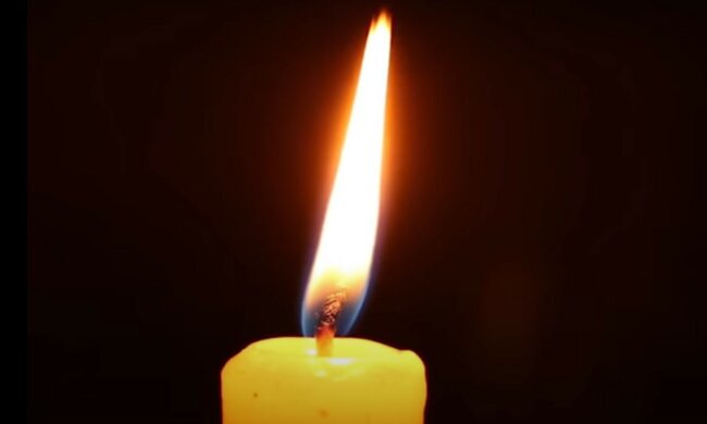 Свеча памяти. Фото: скриншот YouTube-видео