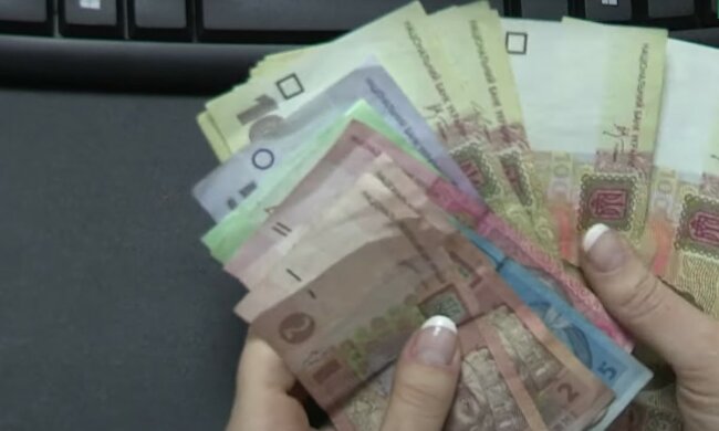 Деньги.  Фото: скриншот YouTube-видео