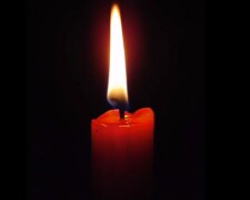 Свеча памяти. Фото: YouTube, скрин
