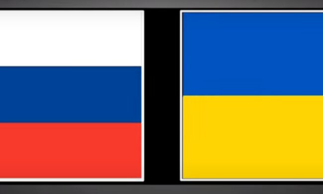 Флаги Украины и России. Фото: скриншот YouTubе