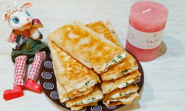 Рецепт сытного и быстрого лаваша с яйцом и зеленью на сковородке. Фото: YouTube